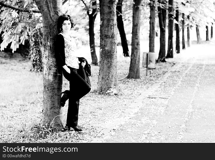 Young woman in a public park. Young woman in a public park