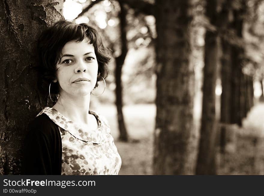 Young woman in a public park. Young woman in a public park