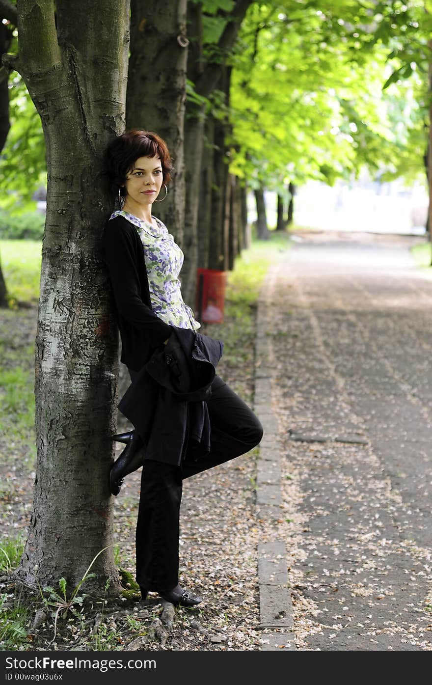 Young woman in a public park. Young woman in a public park