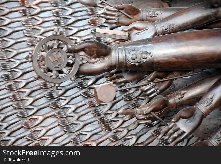 Hands with diverse instruments of thousands hands guanyin statue. Hands with diverse instruments of thousands hands guanyin statue.