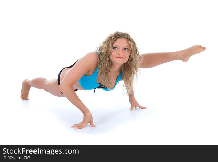 Girl practicing fitness  on  white  background