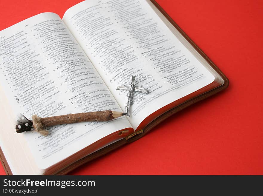 Leather bound bible opened at a piece of scripture