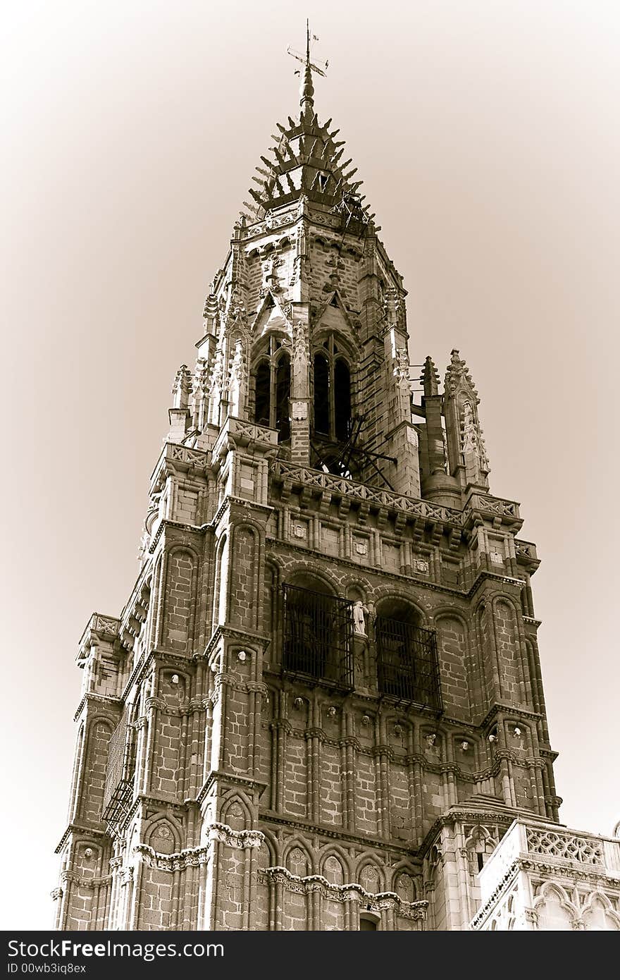 Toledo cathedral main tower from below, old styled.