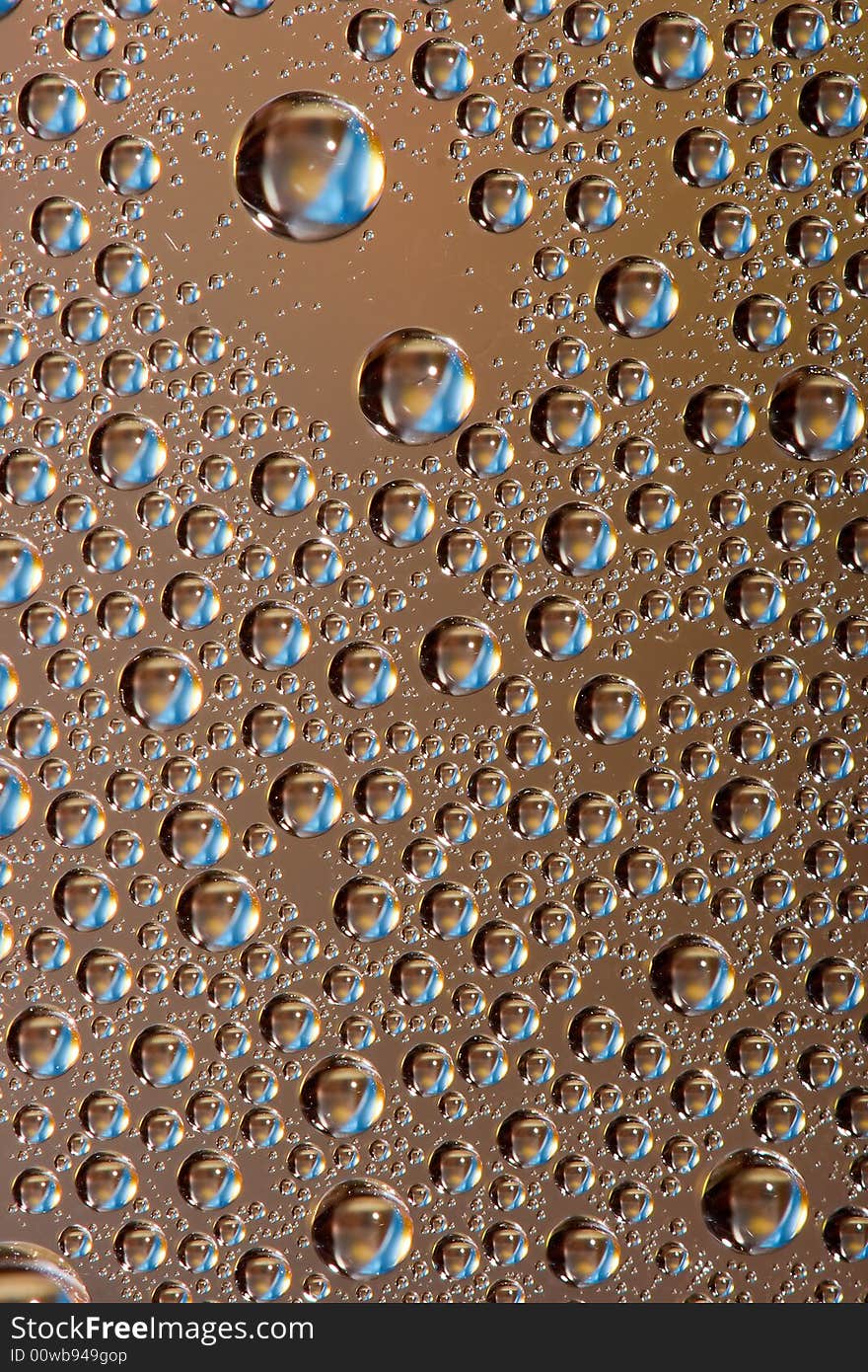 Water drops gold with blue