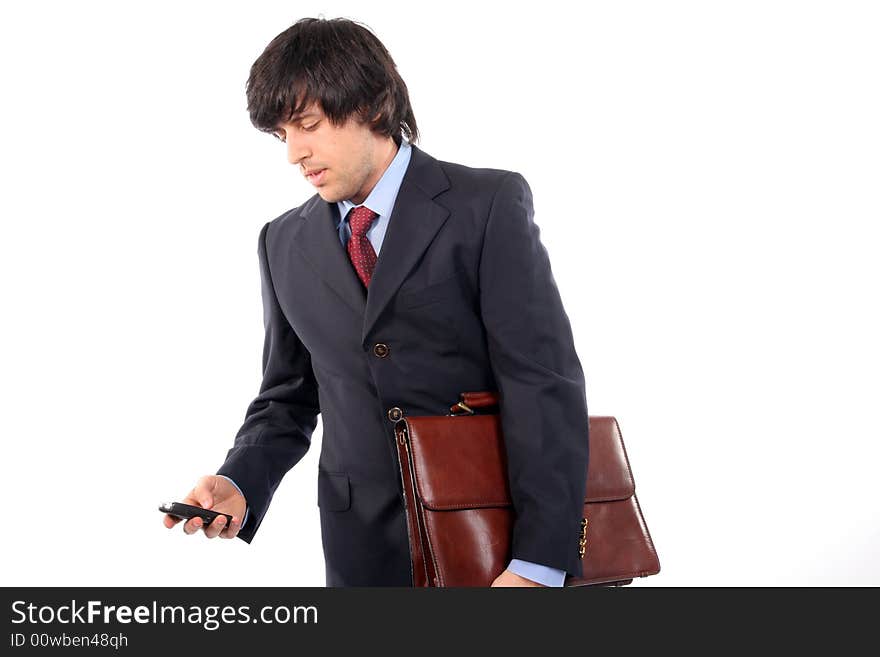 Businessman on the phone over a white background