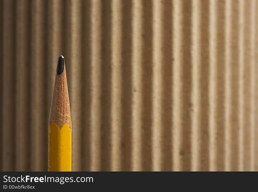 Rounded Corrugated Cardboard Background with Narrow Depth of Field.