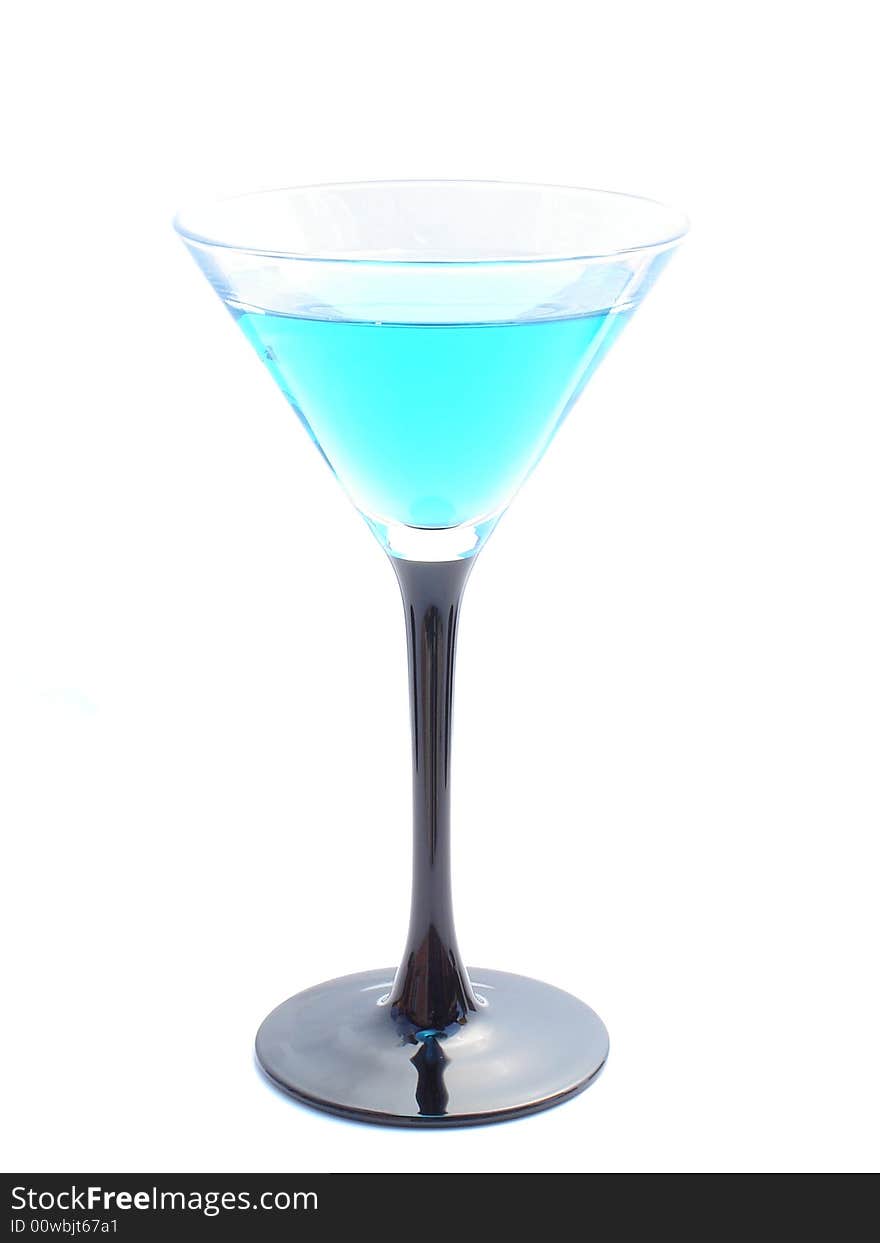 Blue curacao cocktail in a martini glass.