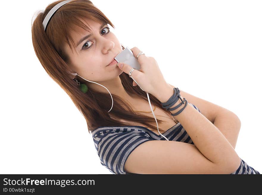 The young girl with a player isolated on a white background