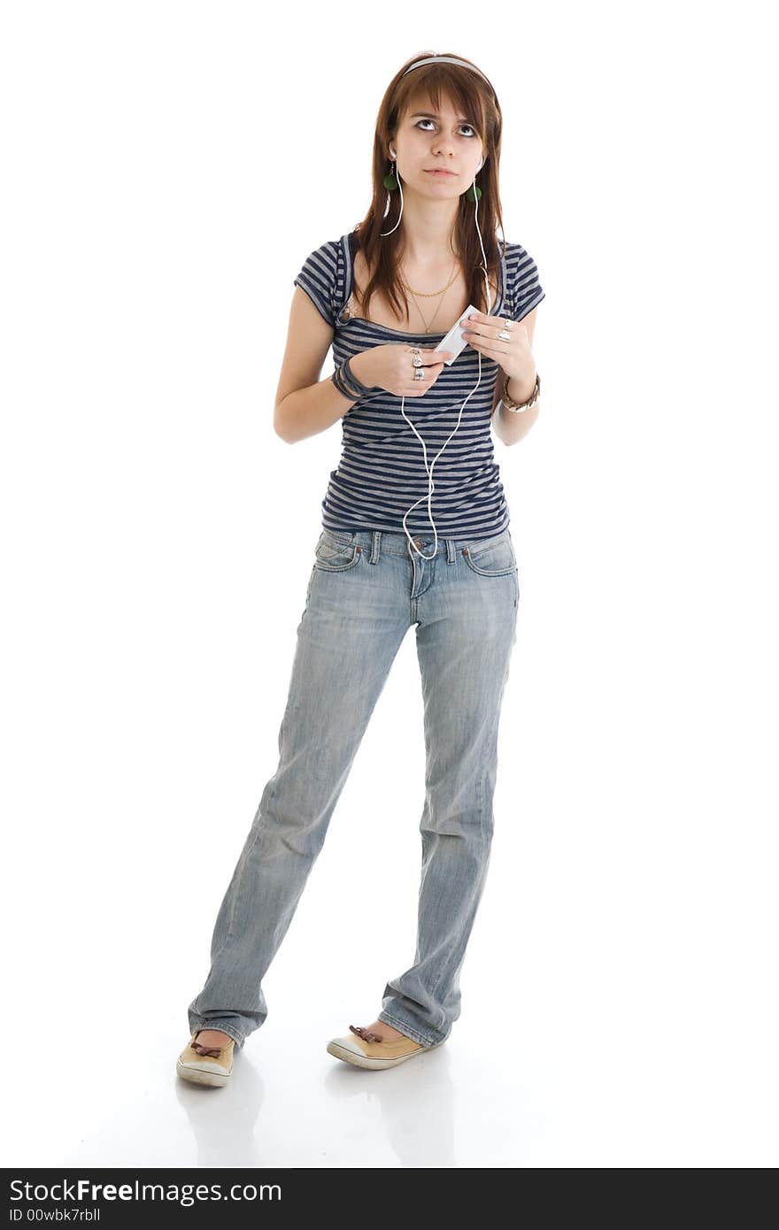 The young girl with a player isolated on a white background