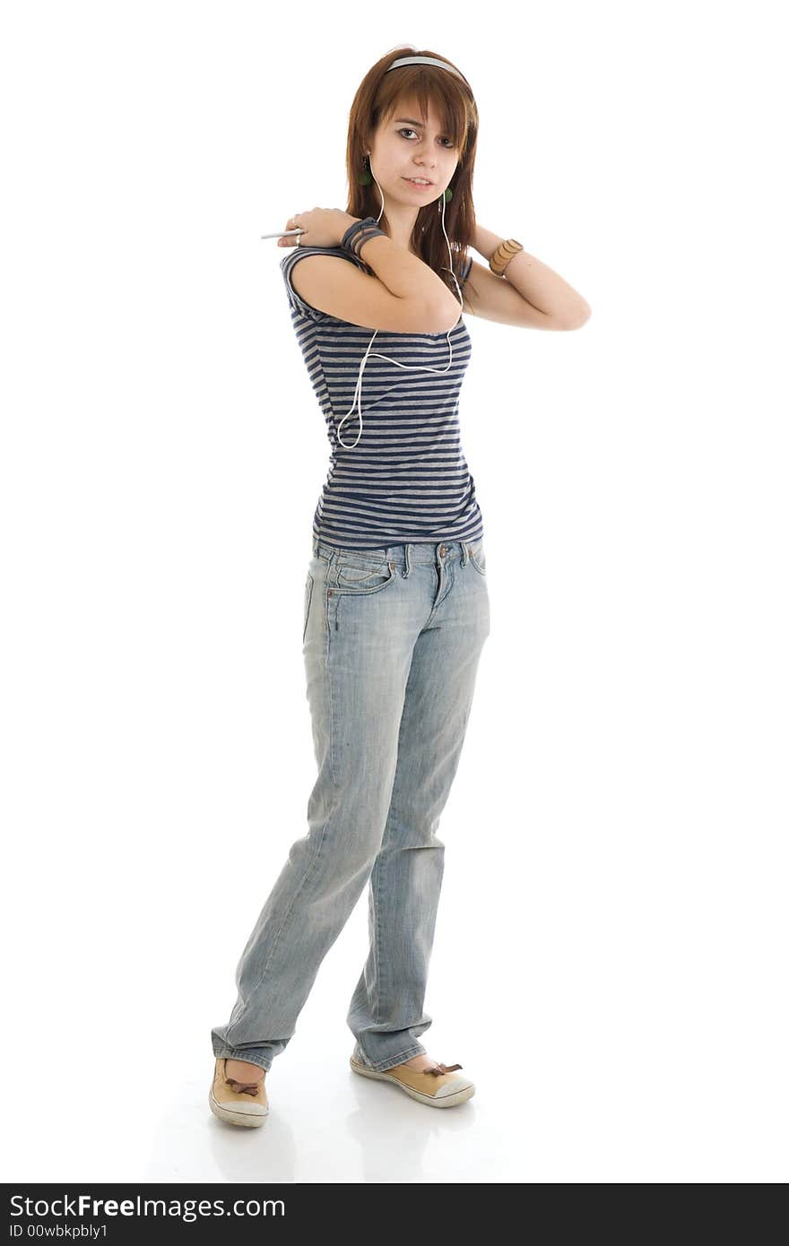 The young girl with a player isolated on a white background