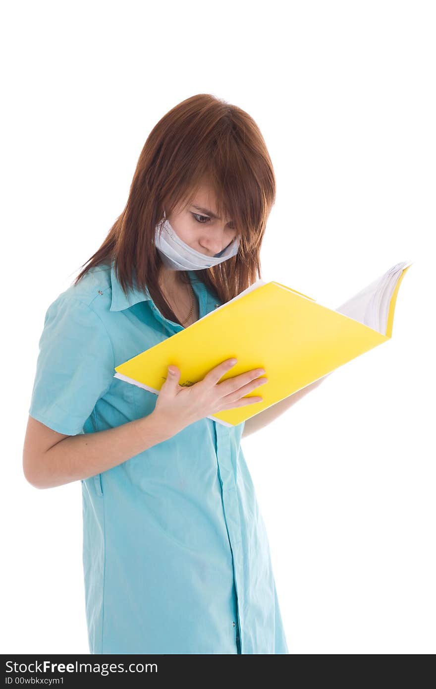 The young attractive nurse with a folder isolated