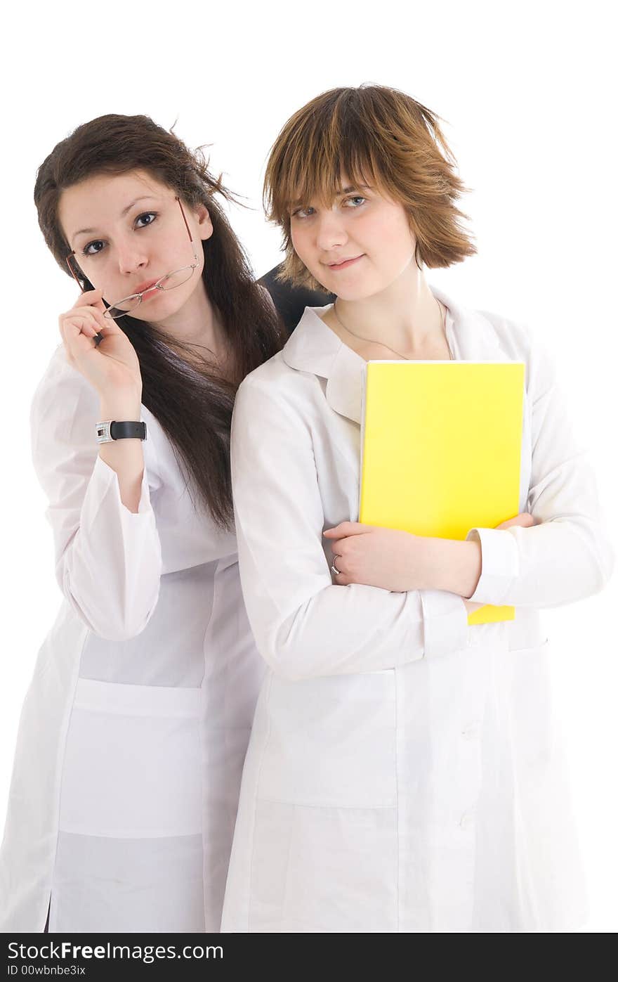 The young attractive nurse with a folder isolated on a white background. The young attractive nurse with a folder isolated on a white background