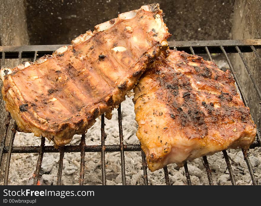 Meat grill on a grate.