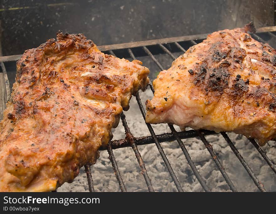 Meat grill on a grate.