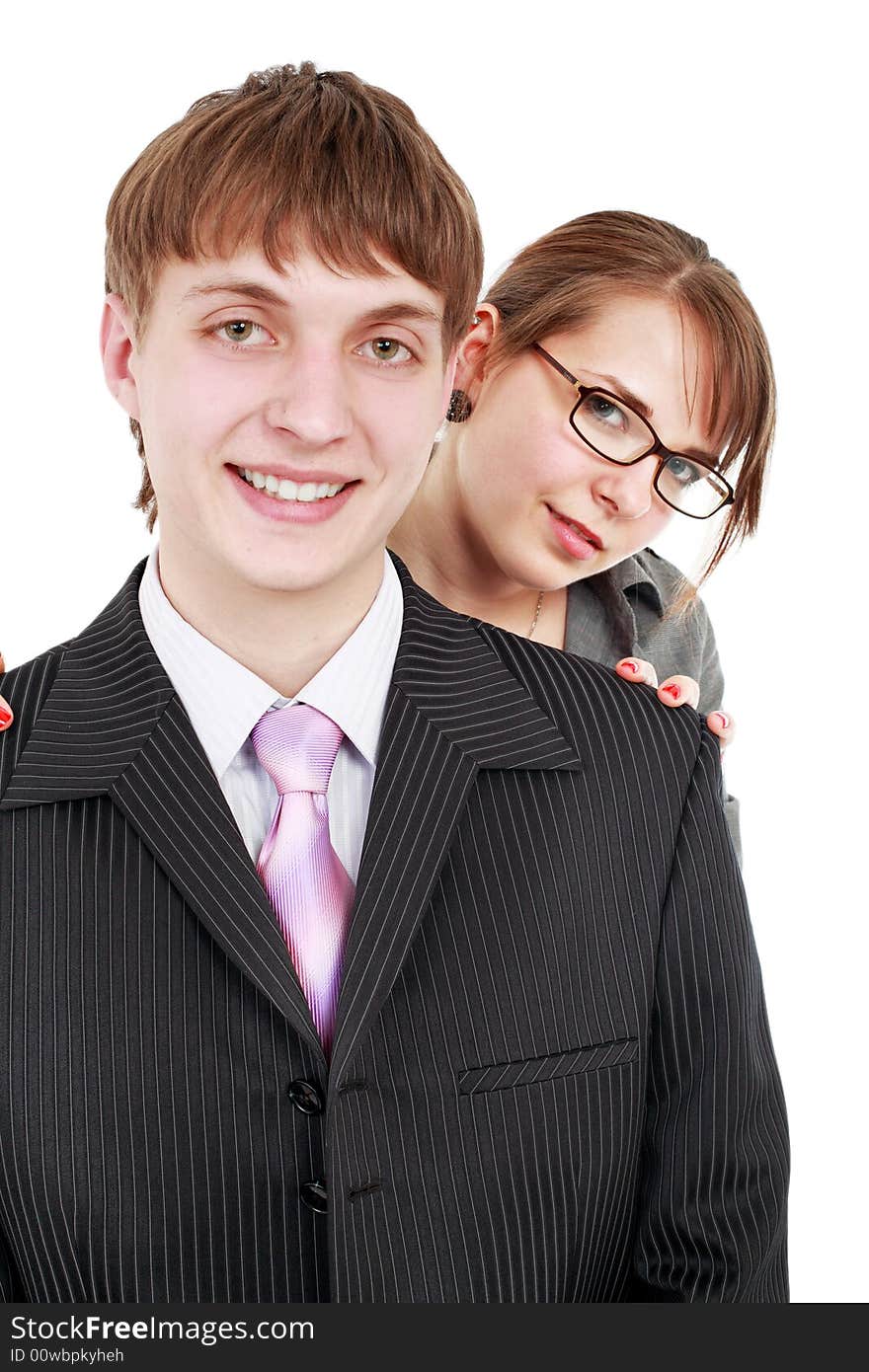 Group of business people working together. Shot in studio. Group of business people working together. Shot in studio.