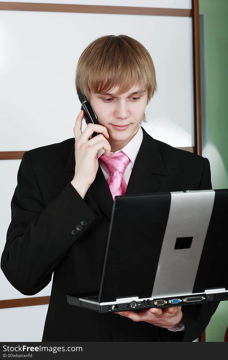 Group of business people working together in the office. Group of business people working together in the office.