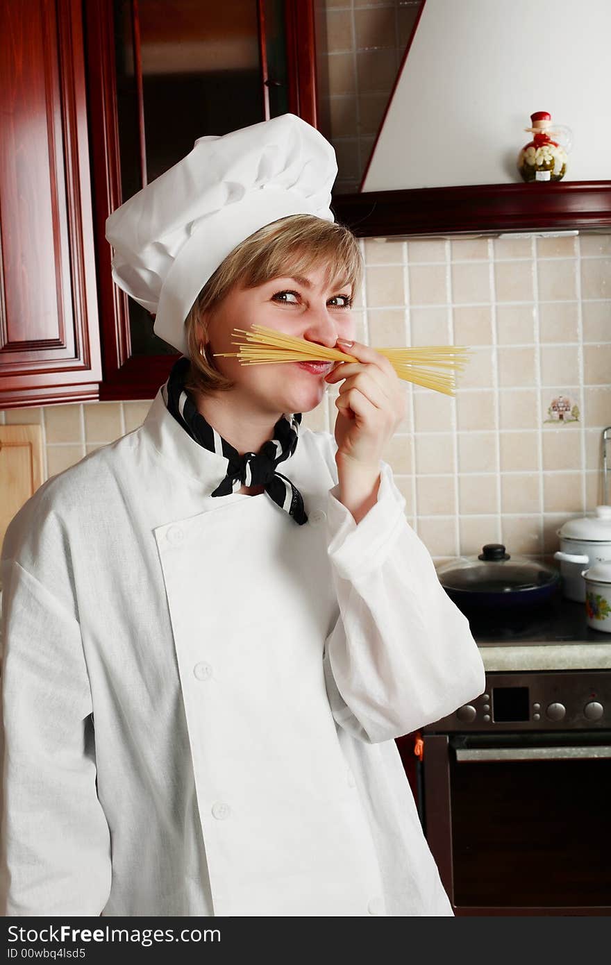 Cook woman cooking on the kitchen. Cook woman cooking on the kitchen