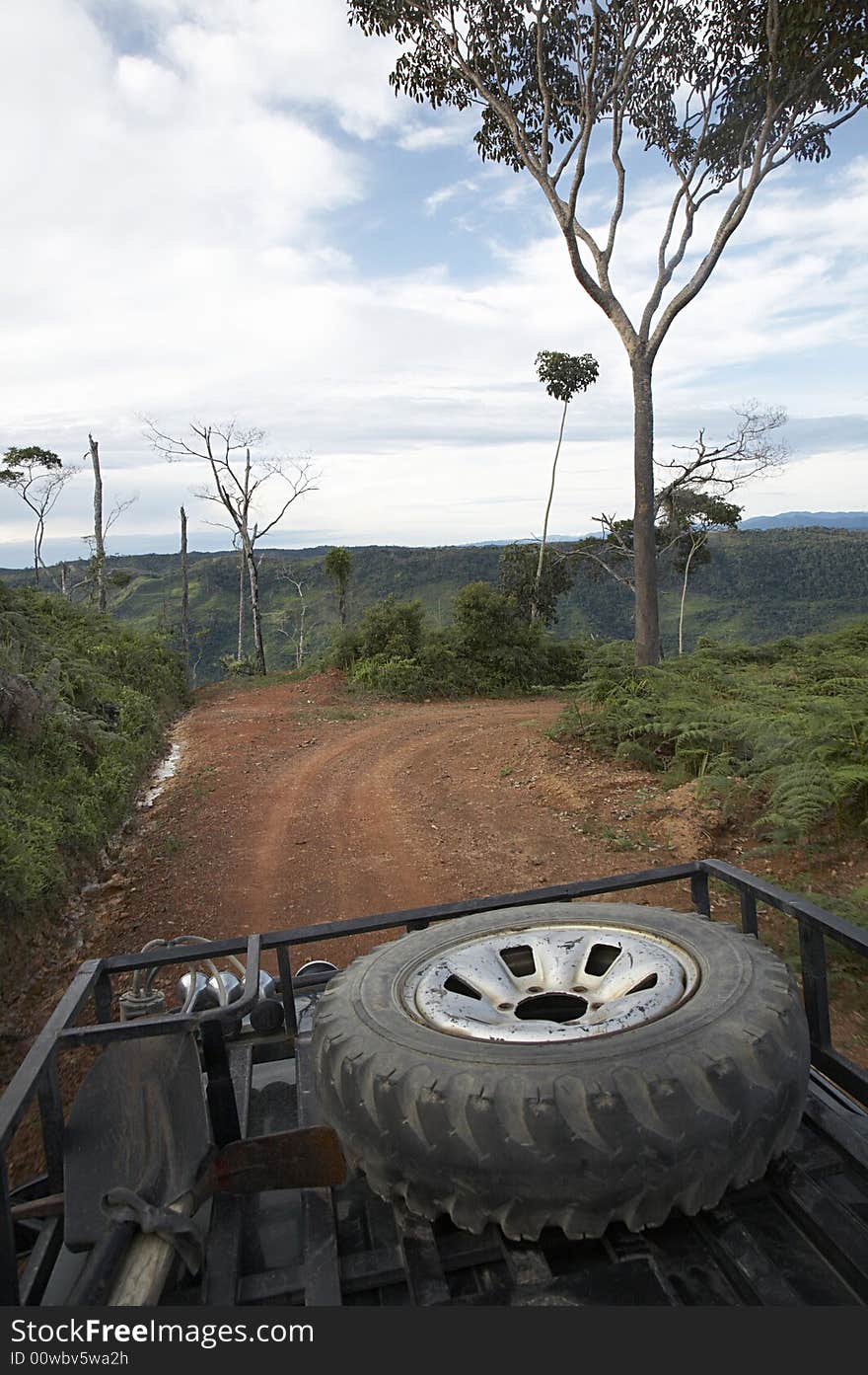 View from a four wheel-drive vehicle traveling in the Yungas region of Bolivia. View from a four wheel-drive vehicle traveling in the Yungas region of Bolivia.