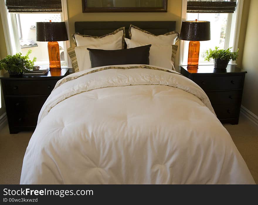 Luxury home bedroom with stylish furniture and decor. Luxury home bedroom with stylish furniture and decor.