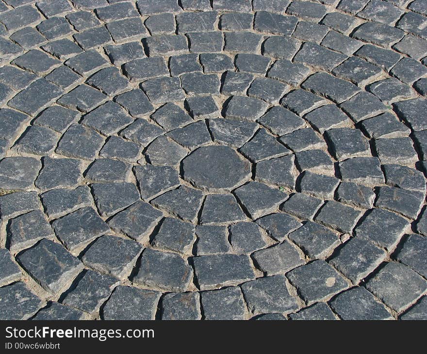 The circular ornament of the Palace (Dvortsovaya) square cobblestone road. The circular ornament of the Palace (Dvortsovaya) square cobblestone road.