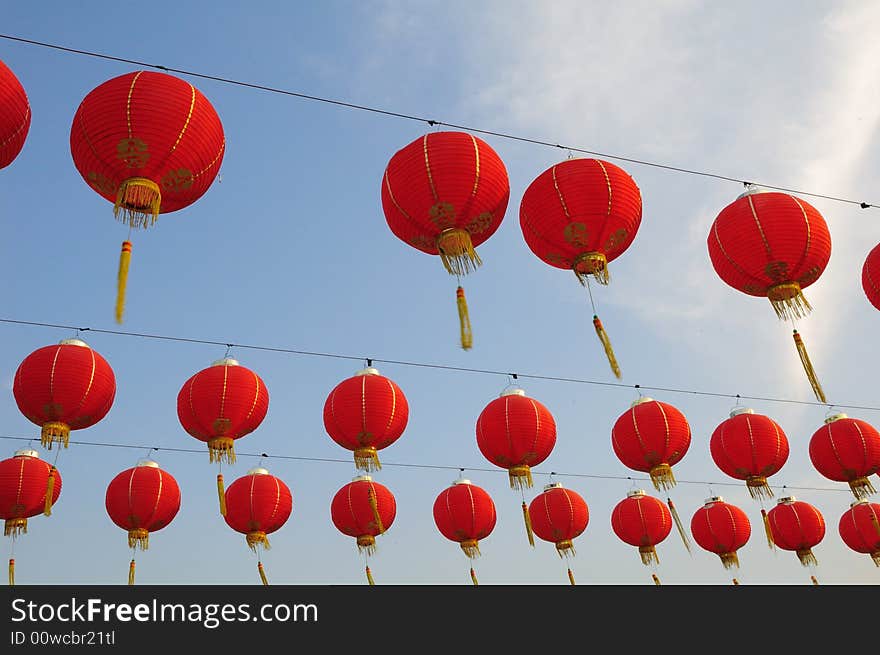 Red lanterns under the background of blue sky.