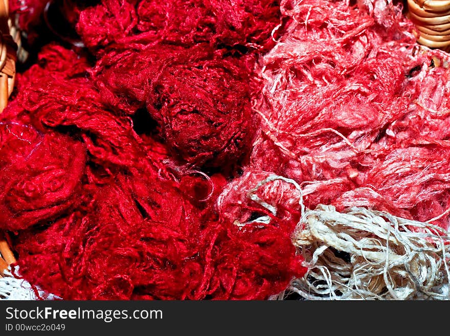 Bunch of red and pink silk thread. Bunch of red and pink silk thread