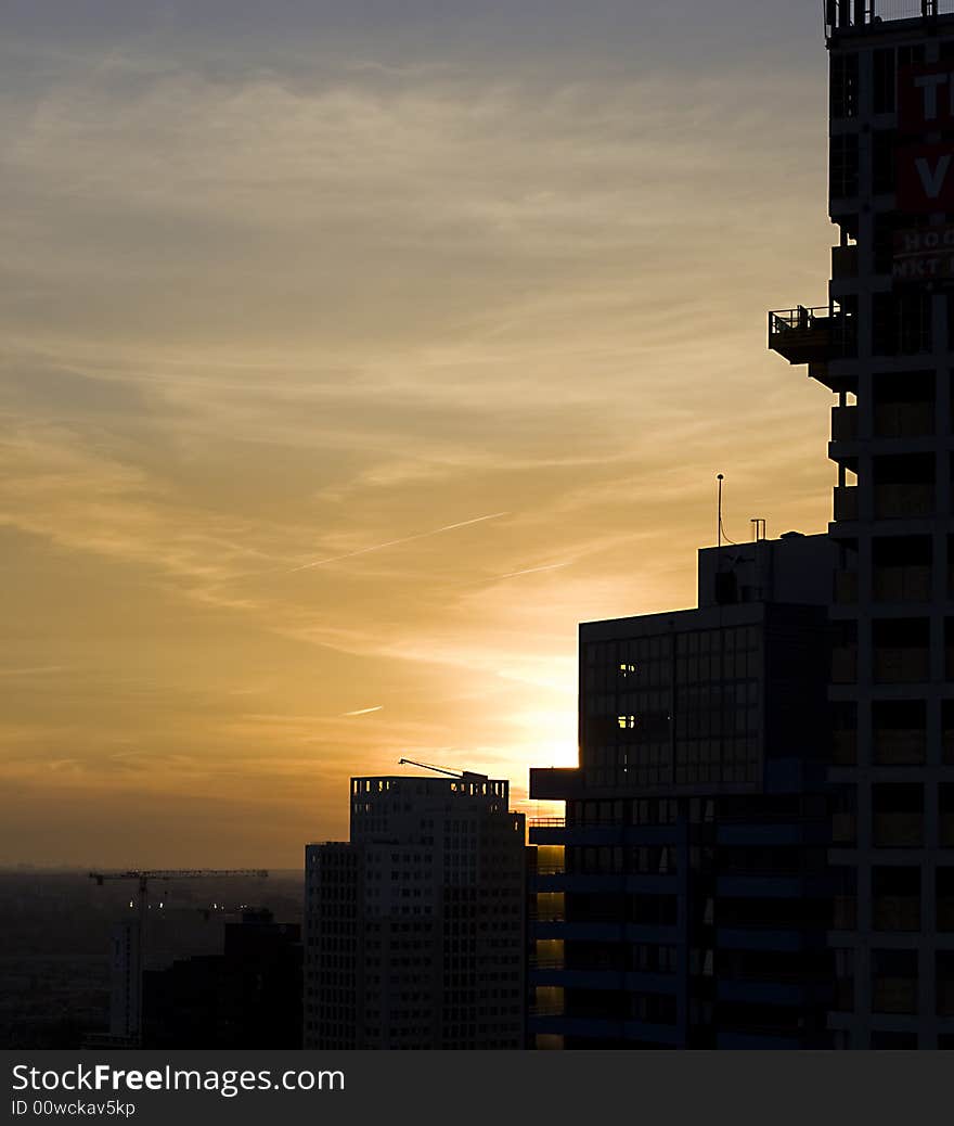 Sunset in Rotterdam behind buildings. Sunset in Rotterdam behind buildings