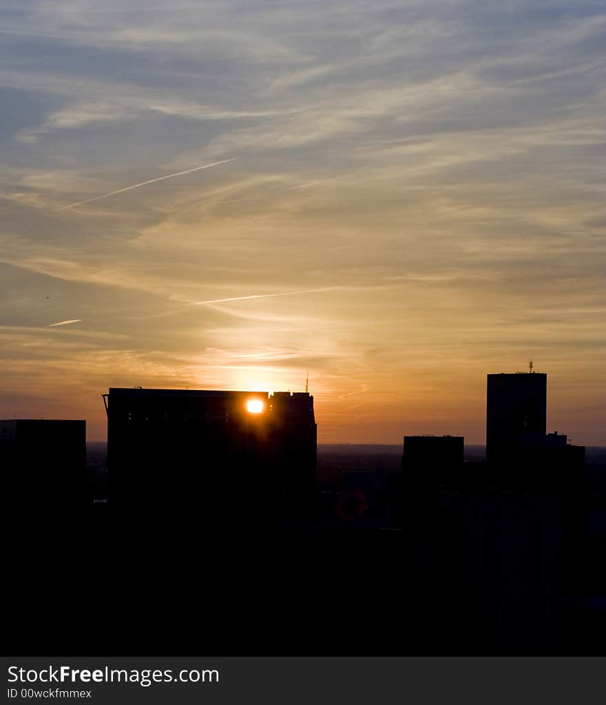 Sunset in Rotterdam behind buildings. Sunset in Rotterdam behind buildings