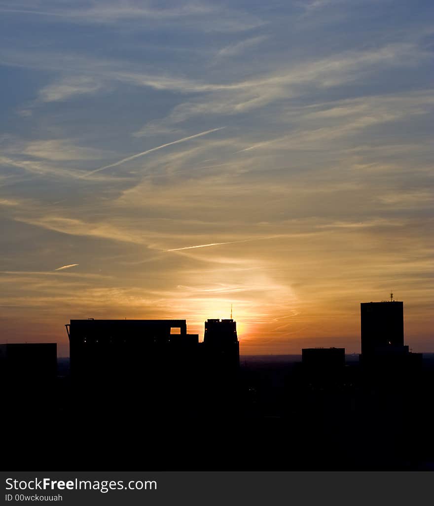 Sunset in Rotterdam behind buildings. Sunset in Rotterdam behind buildings