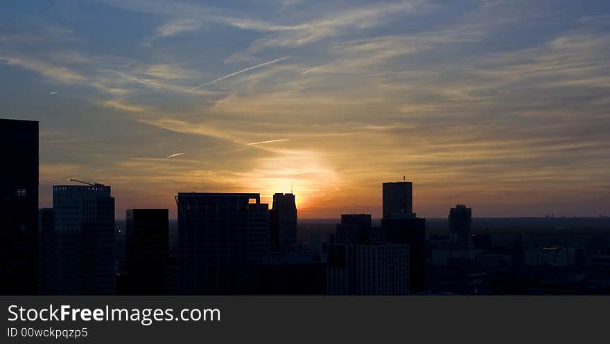 Sunset behind building