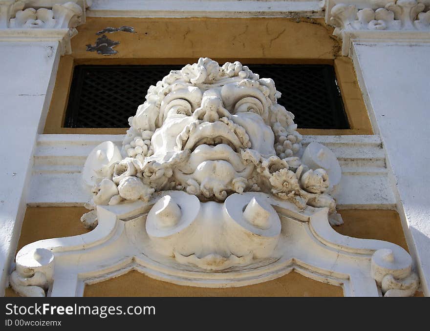 A beautiful detailed sculpture above an entrance