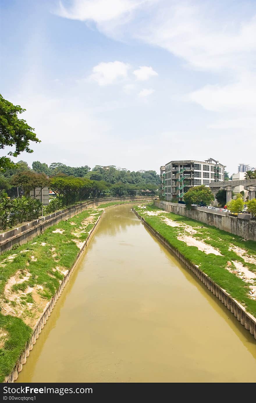 Muddy river through city, malaysia