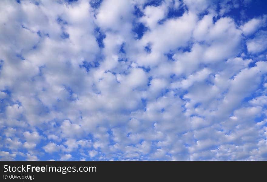 Altocumulus like clouds forming a pleasing texture in Italy's sky. Altocumulus like clouds forming a pleasing texture in Italy's sky....