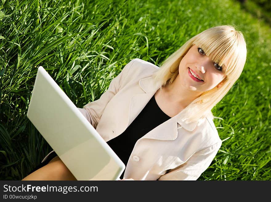 Smiling blond girl with notebook. Smiling blond girl with notebook