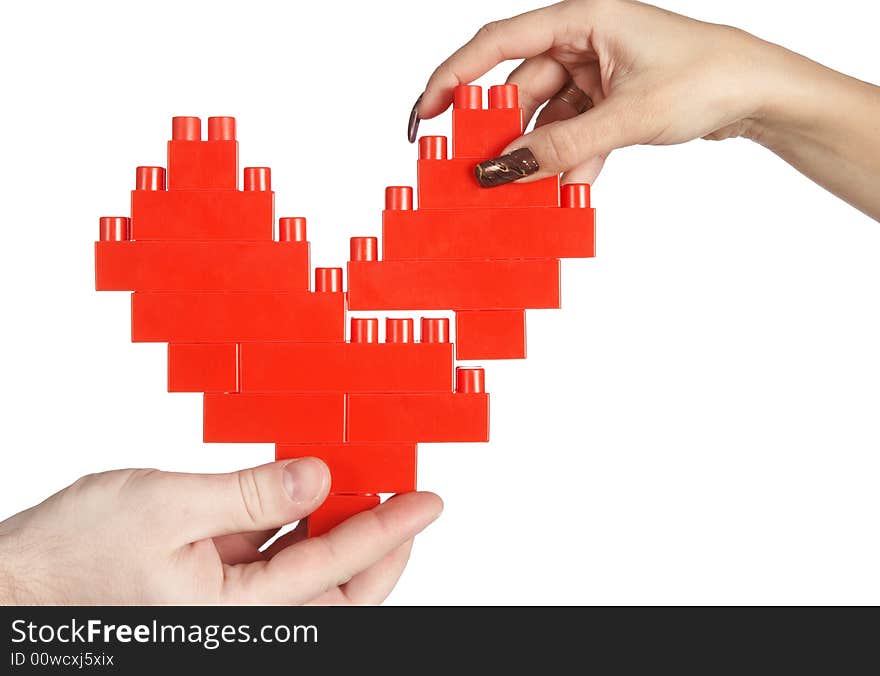 Hands building heart isolated over white background