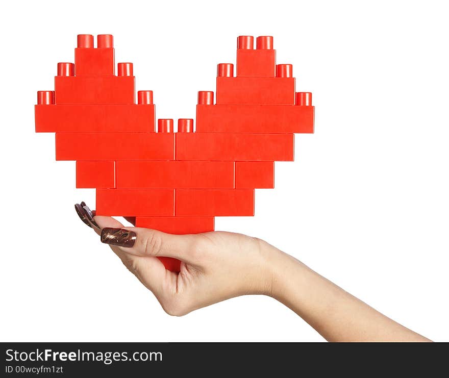 Woman hand holding red heart