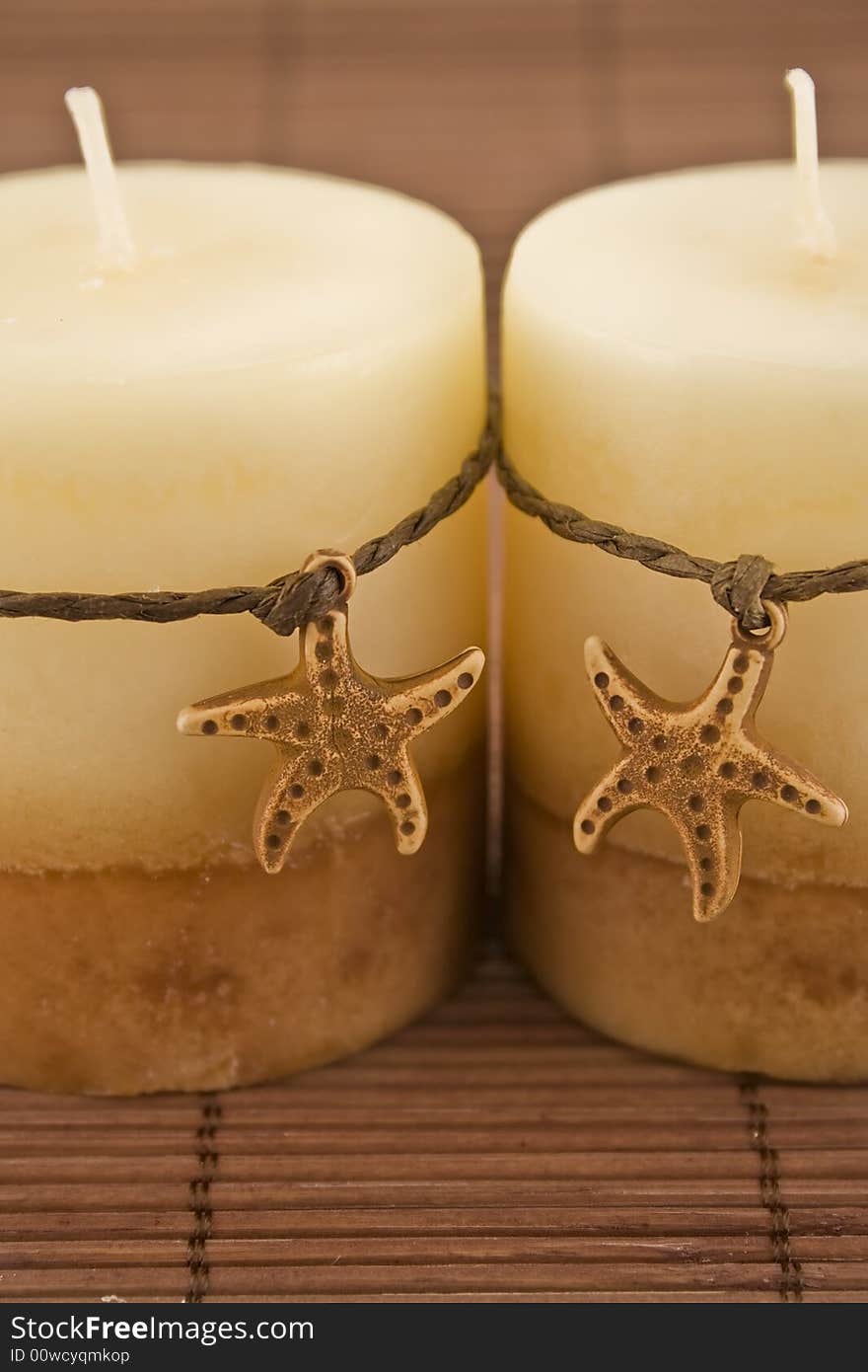 Incense candle on brown background