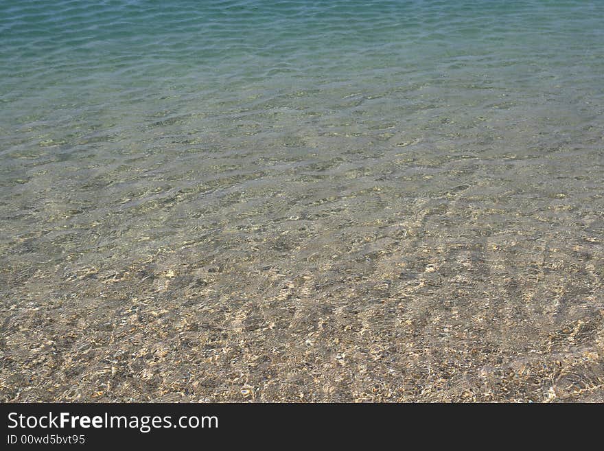 Background of sea water reaching the shore. Background of sea water reaching the shore