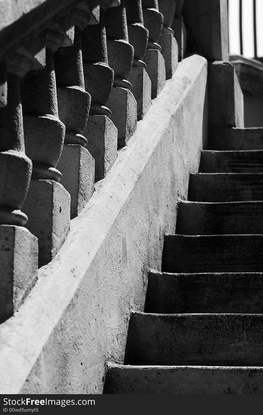 Concrete stairs and railing in black & white.