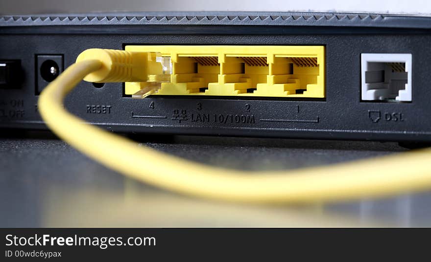 Modem with yellow sockets, macro.