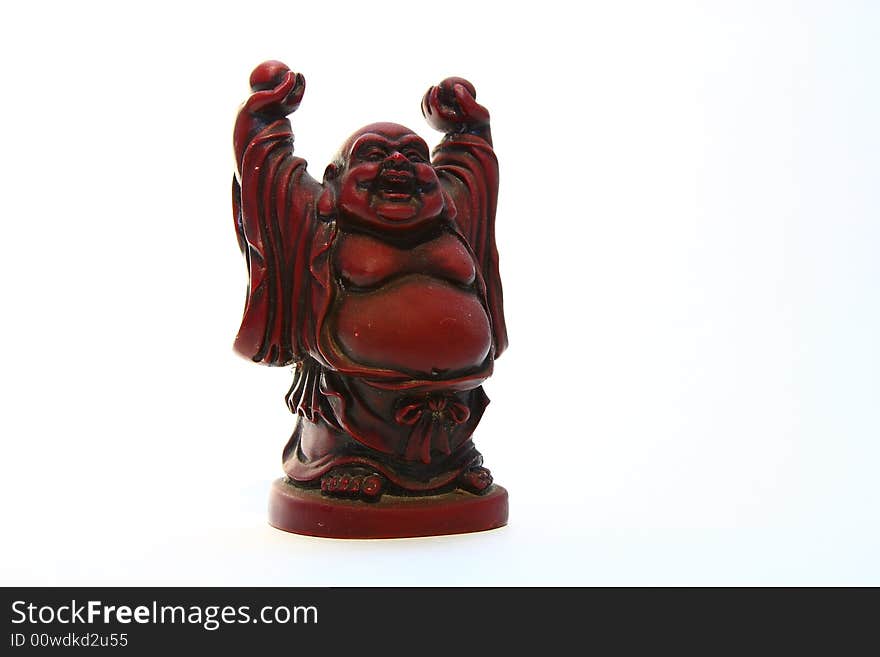 Isolated shot of red buddha statue on white background