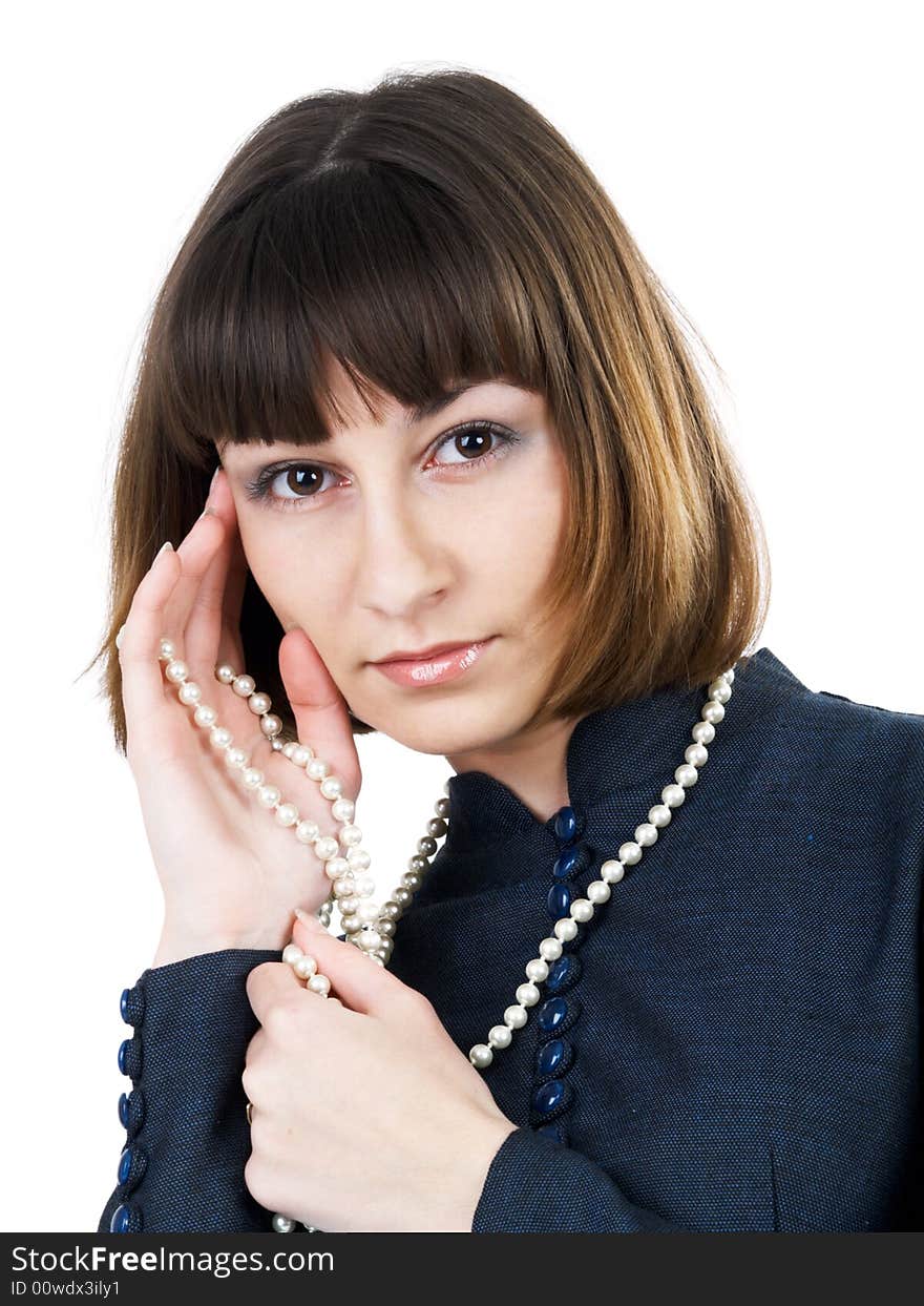 Beautiful girl with beads looking to camera