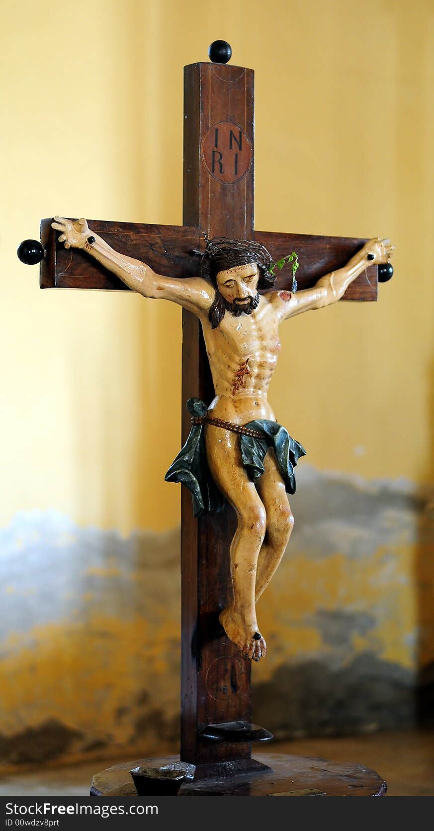 Realistic statue of Christ on the cross. Realistic statue of Christ on the cross