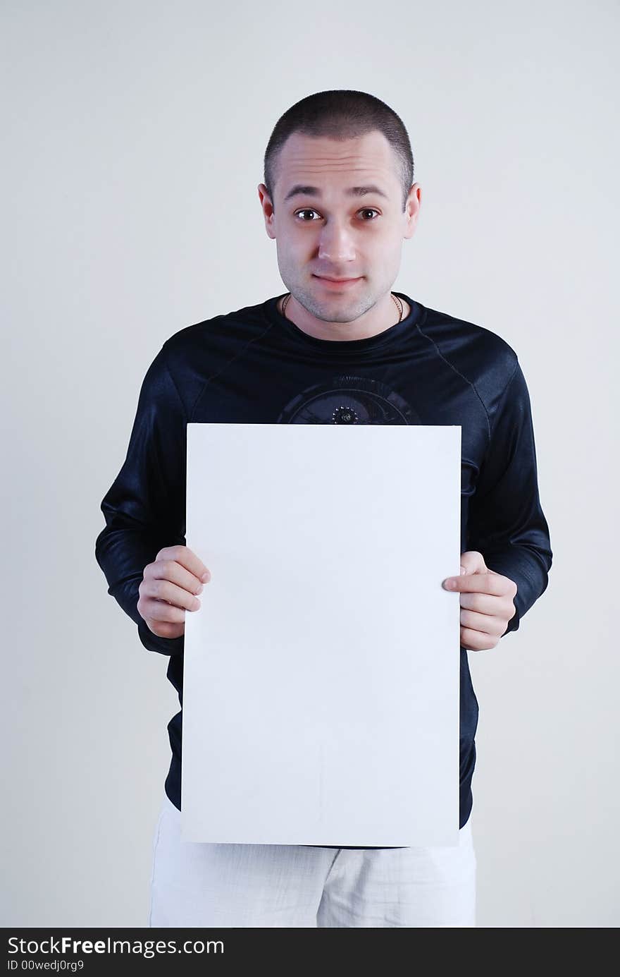 Man with placard at white background