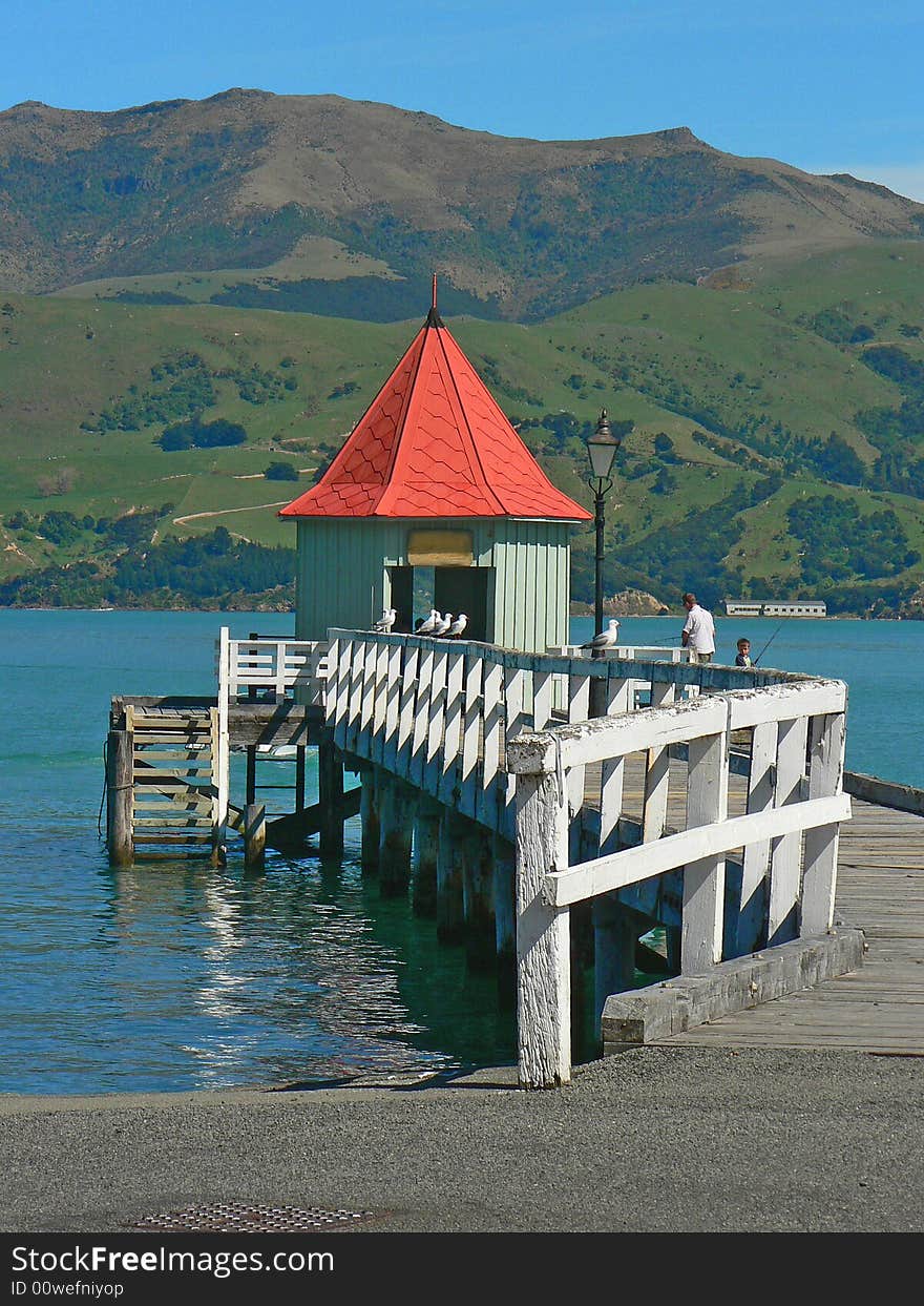 A short jetty leads end with a red-roofed shelter. Steps down allow access to the water. A short jetty leads end with a red-roofed shelter. Steps down allow access to the water