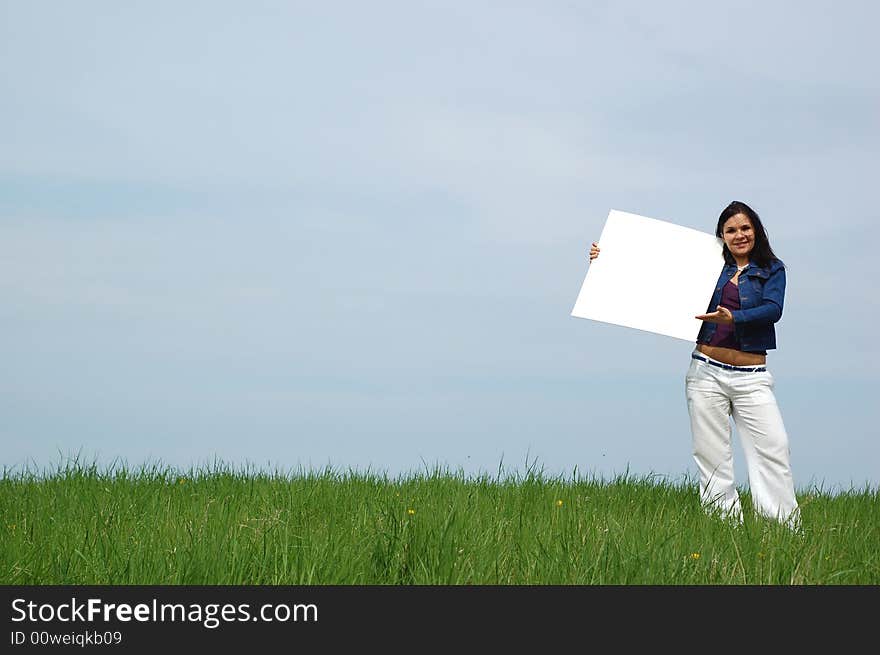 Attractive brunette woman on sky background. Attractive brunette woman on sky background