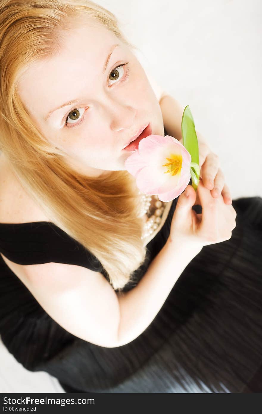 Young Woman With Tulip