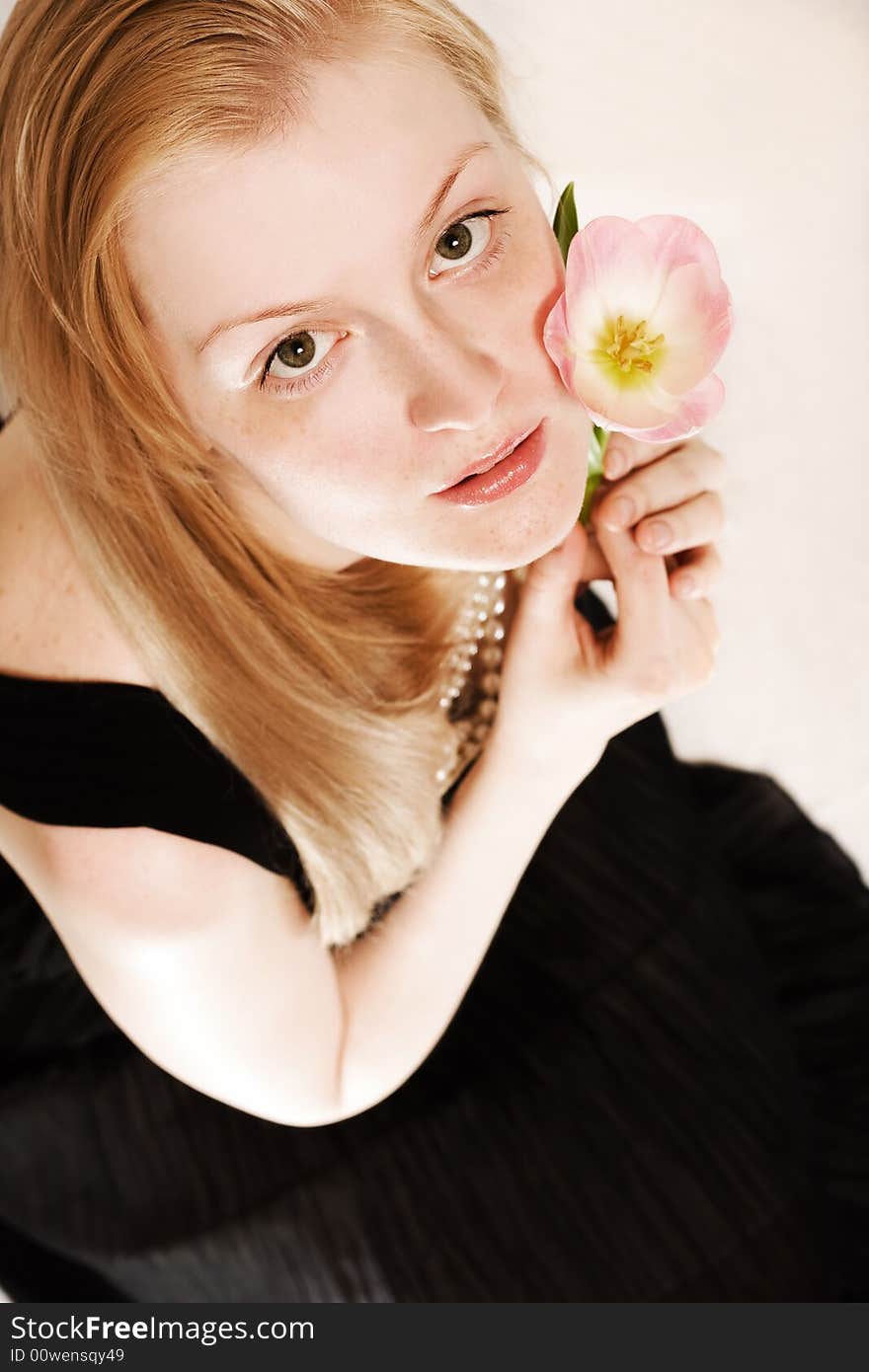 Young woman with tulip