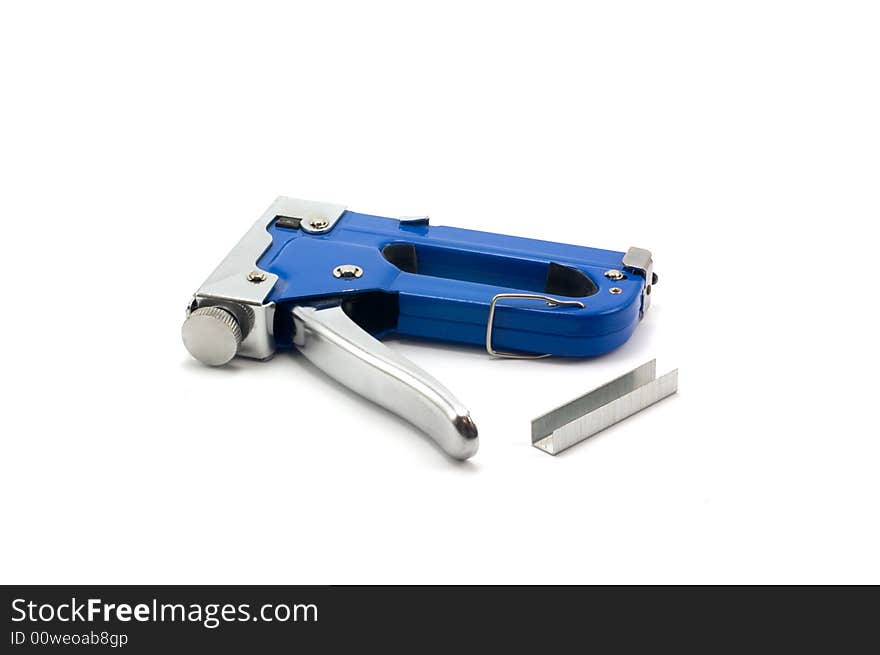 Staple gun for attaching objects