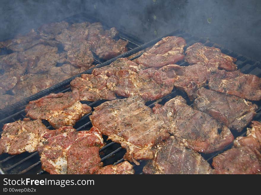 Close up of grilled meat and sausage, outdoor. Close up of grilled meat and sausage, outdoor